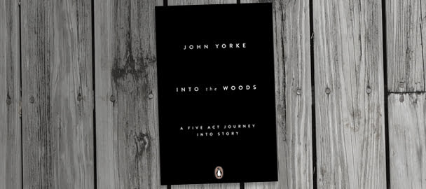 Picture of Into the woods book on a wooden table black and white